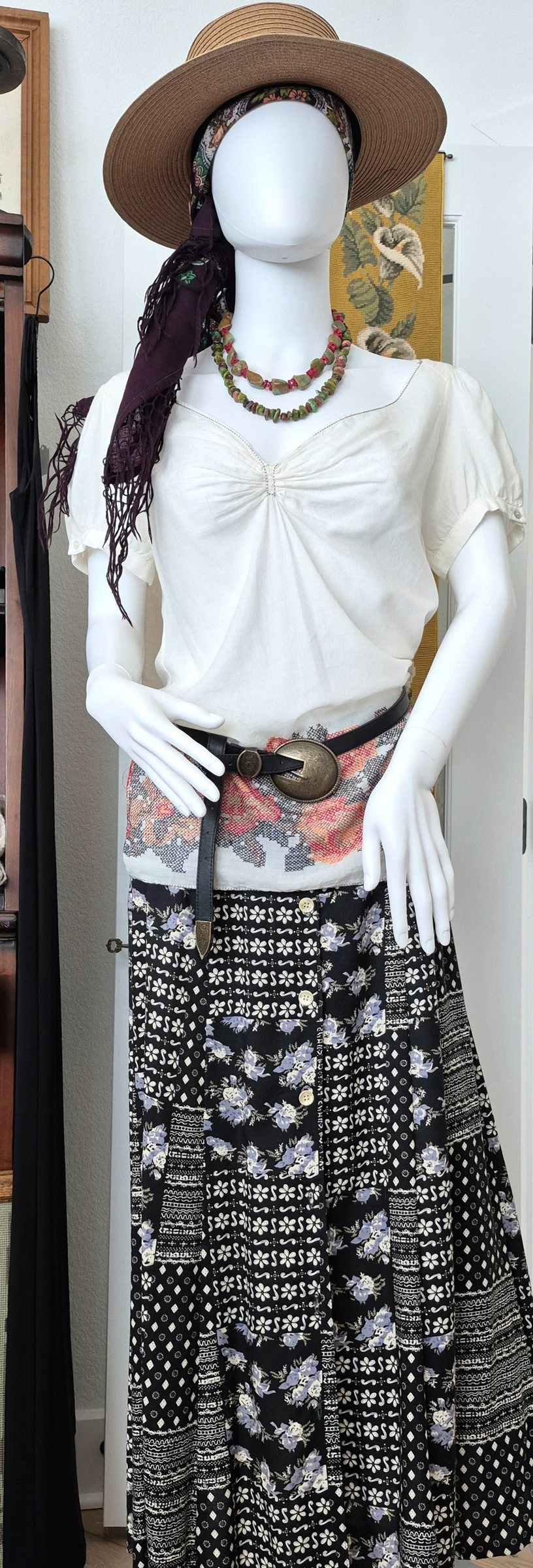 A layered vintage look combining several floral and geometric patterns