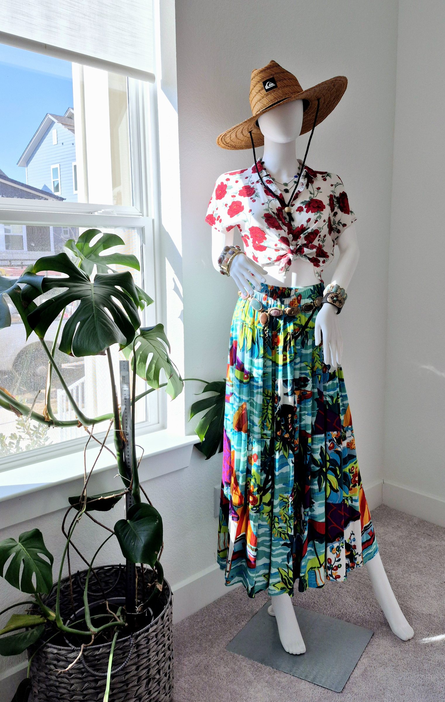 A rose and aqua vintage combination styled with jewelry and a belt